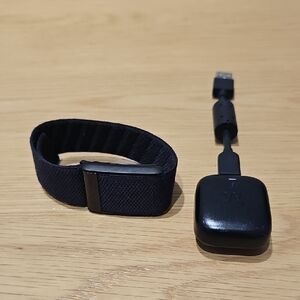 WHOOP- Black Fitness Tracker with Charging Cable